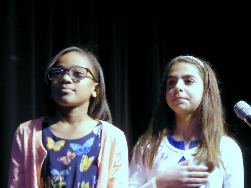 Skye Correy and Anahit Sinanyan, daughters of Portantino staff, leading pledge of allegiance at swearing in celebration